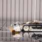 Side profile of SolarCleano F1 cleaning a solar panel, highlighting its compact body, tracks, and brush roller in contact with panel surface.
