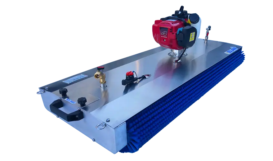 PVCARE FK1 roof and ground solar panel cleaning machine viewed at an angle, featuring a long brush head and caterpillar-style tracks positioned on solar panels