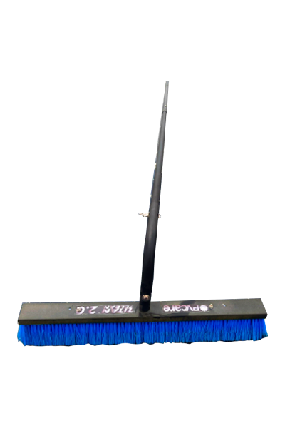 Broom with blue bristles and black handle on a white background