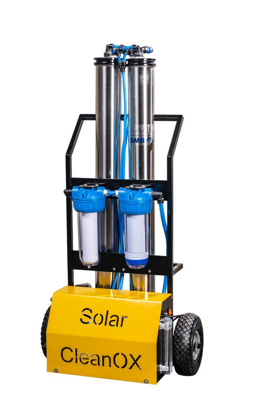 Solar cleaning machine labeled “Solar Ox” with two side wheels, designed to spray water for cleaning panels.